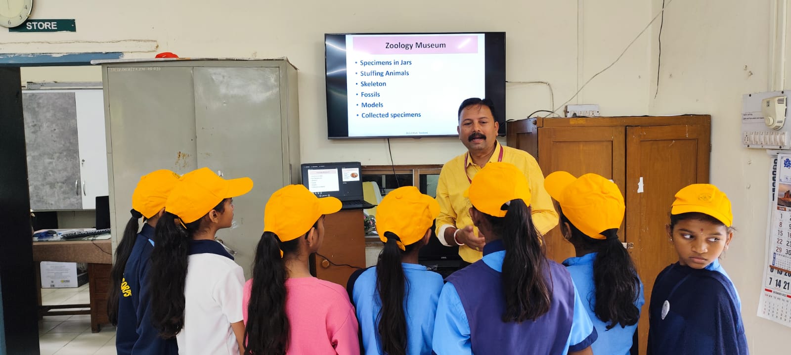 4. Dr. G. A. Wagh explaining animal classification and taxidermy at station IV
