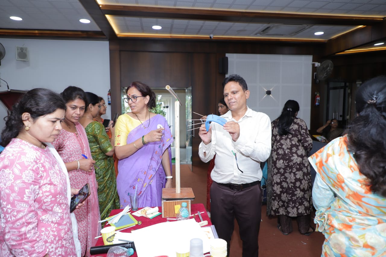 Science Teachers Performing  Experiments