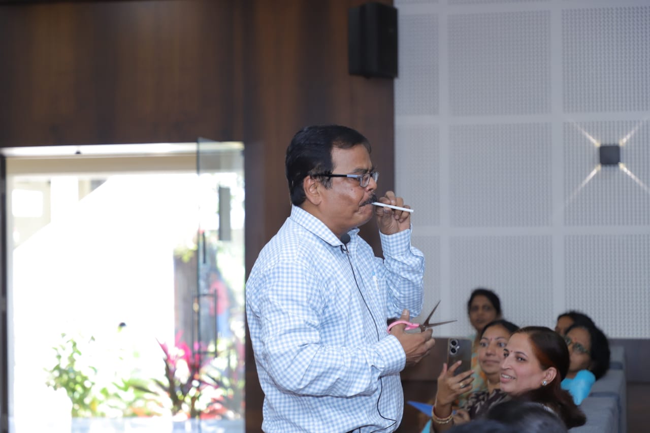 Resource person of the workshop Mr. Sanjay  Tikariashowing Sound Expt.to the teachers